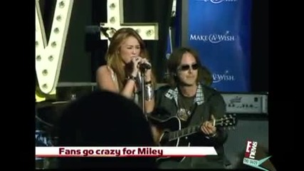 Miley on E News (at The Grove for Make - A - Wish) 