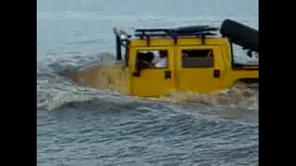 Hummer Driving Into Lake 