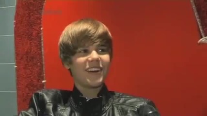 Bieber - whips his hair back and forth.