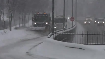 Snow plows clearing the highway in Norway