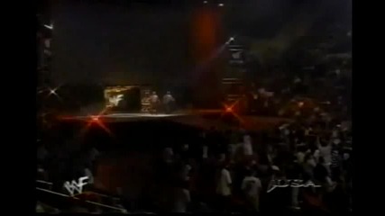 Undertaker and Kane vs Animal and Droz