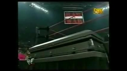 Undertaker_vs_the_rock_casket_ma