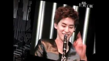 Kyuhyun playing -u- with his clarinet @ 100523 Fan-meeting