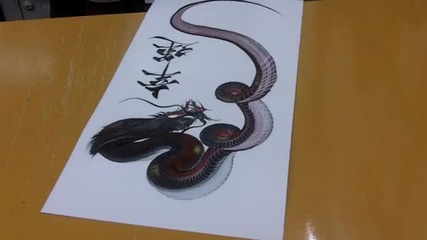 Японец рисува дракон