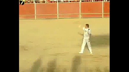 Guy Jumps Over A Bull.