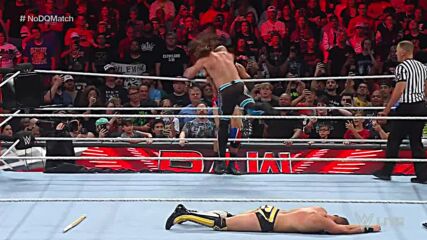 AJ Styles Phenomenal Forearms Ciampa through a table