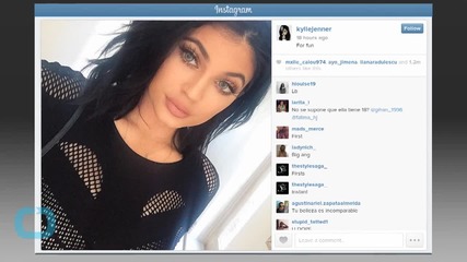 Kylie Jenner Pulls a Kimye, Tries on Bright Blue Contact Lenses