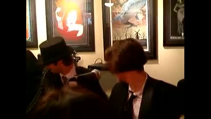 Jackson Rathbone and 100 Monkeys performing