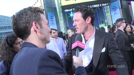 Звездата Люк Еванс на премиерата на филма си Бързи и Яростни 6 (2013)