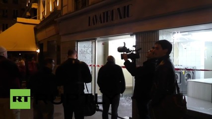 France: Flowers placed through bullet-holes at the cafes of Friday's terror