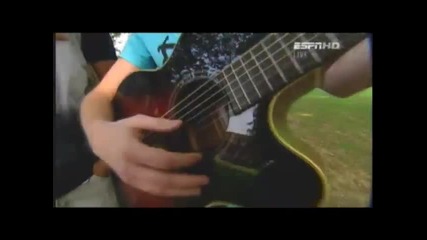 Chris Cohen teaches Didier Drogba the guitar