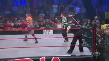 Running European Uppercut on opponent in the corner - Desmond Wolfe