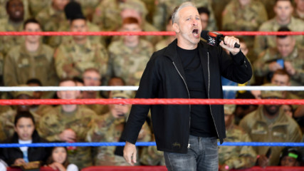 Special guest Jon Stewart laughs with the U.S. Armed Forces: WWE Tribute to the Troops, Dec. 20, 2018