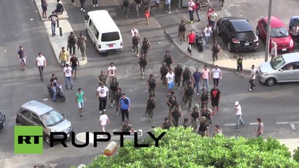 Lebanon: Beirut protesters burn tyres in demo against soldier's death