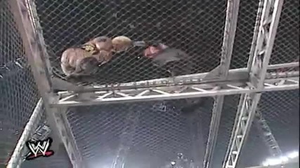 Undertaker Throws Rikishi From Top Of The Hell In A Cell Cage !