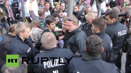 Germany: Clashes break out at anti-German Unity Day protest