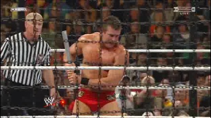 Ортън си тръгва първи от клетката. Дибиаси го елиминира. | Elimination Chamber 2010 | 