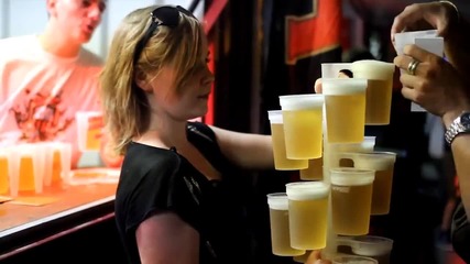 Girl Carries 20 Beer Cups!