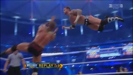 Randy Orton reverses Cm Punk's Springboard Clothesline into a Rko in mid-air