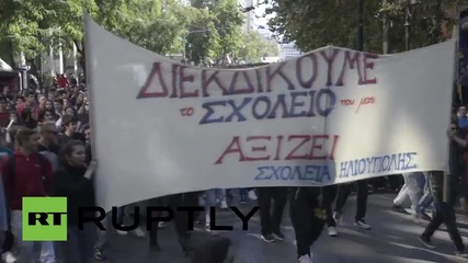 Greece: School children clash with police outside the Greek Parliament