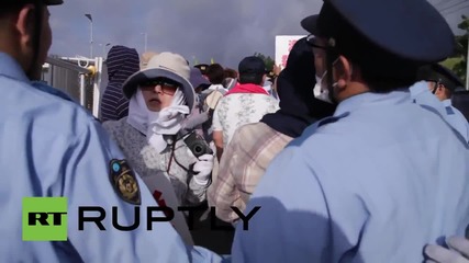 Japan: Scuffles break out bewteen police and anti-US abse protesters at Camp Schwab