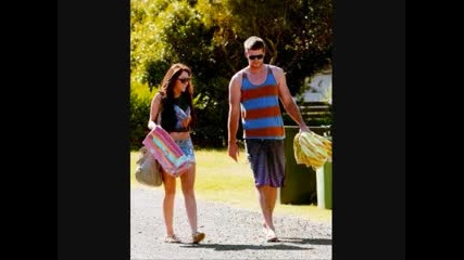 Miley and Liam on the beach 
