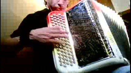 Johnny - Lee Leslie playing accordion on a boat - Geneva 