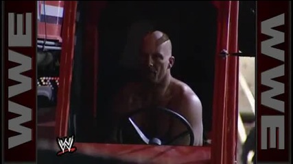 Stone Cold flips Triple H s car