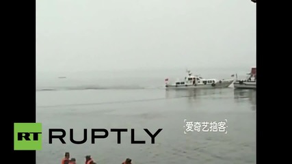 China: Rescue workers continue search for Eastern Star survivors