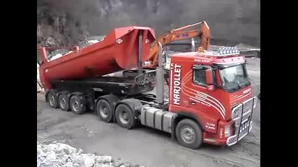 Volvo unloading stones 