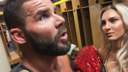 SmackDown Women's Champion Charlotte Flair attempts to wear Bobby Roode's robe to the ring