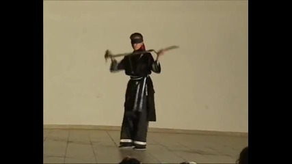 Демонстрация с трестепена шаолинска тояга