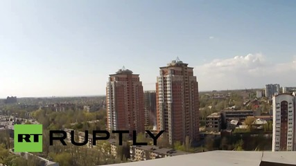 Ukraine: Smoke rises in Donetsk's Kievsky residential district