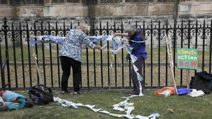 Thousands Join Mass Climate Change Lobby Outside UK Parliament