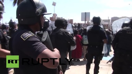 Сблъсъци в Сан Куентин (Мексико) след като полицията влиза неправомерно в къща