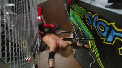 Super Chokeslam through two Tables