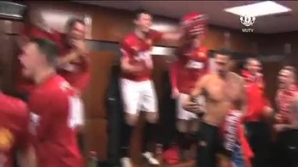 Manchester United celebrate the 20th champions in the dressing room