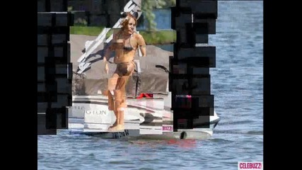 Miley Cyrus Bikinis in Michigan With Liam Hemsworth And her new puppy