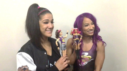 Bayley, Becky Lynch and Charlotte see their new Mattel dolls for the first time