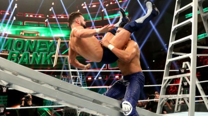 Andrade powerbombs Finn Bálor onto a ladder: WWE Money in the Bank 2019 (WWE Network Exclusive)