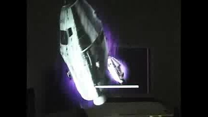 Spacecraft With Laptop Behind