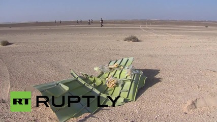 Egypt: EMERCOM workers search Sinai crash site for victims' belongings