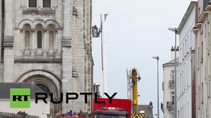 France: Roof of 19th century basilica goes up in flames