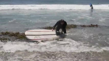 Attacked Surfing in Malibu / Christian Beadles