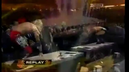 Edge Spears Chris Jericho into the Barricade