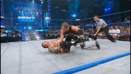 Jimmy Rave Spears Kid Kash in mid-air