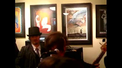 Jackson Rathbone and 100 Monkeys performing