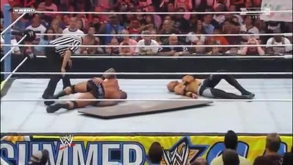 Randy Orton Superplex Christian through a table