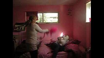 Natalie Beats Kasie With Pink Thing