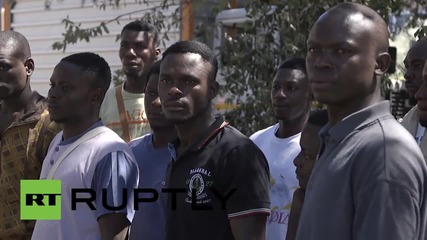 Italy: Migrant 'volunteers' clean up storm-damaged Florence